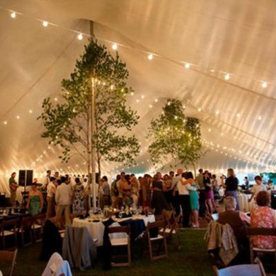 Dance Floor Placed In Center Of Tent Between Center Pole